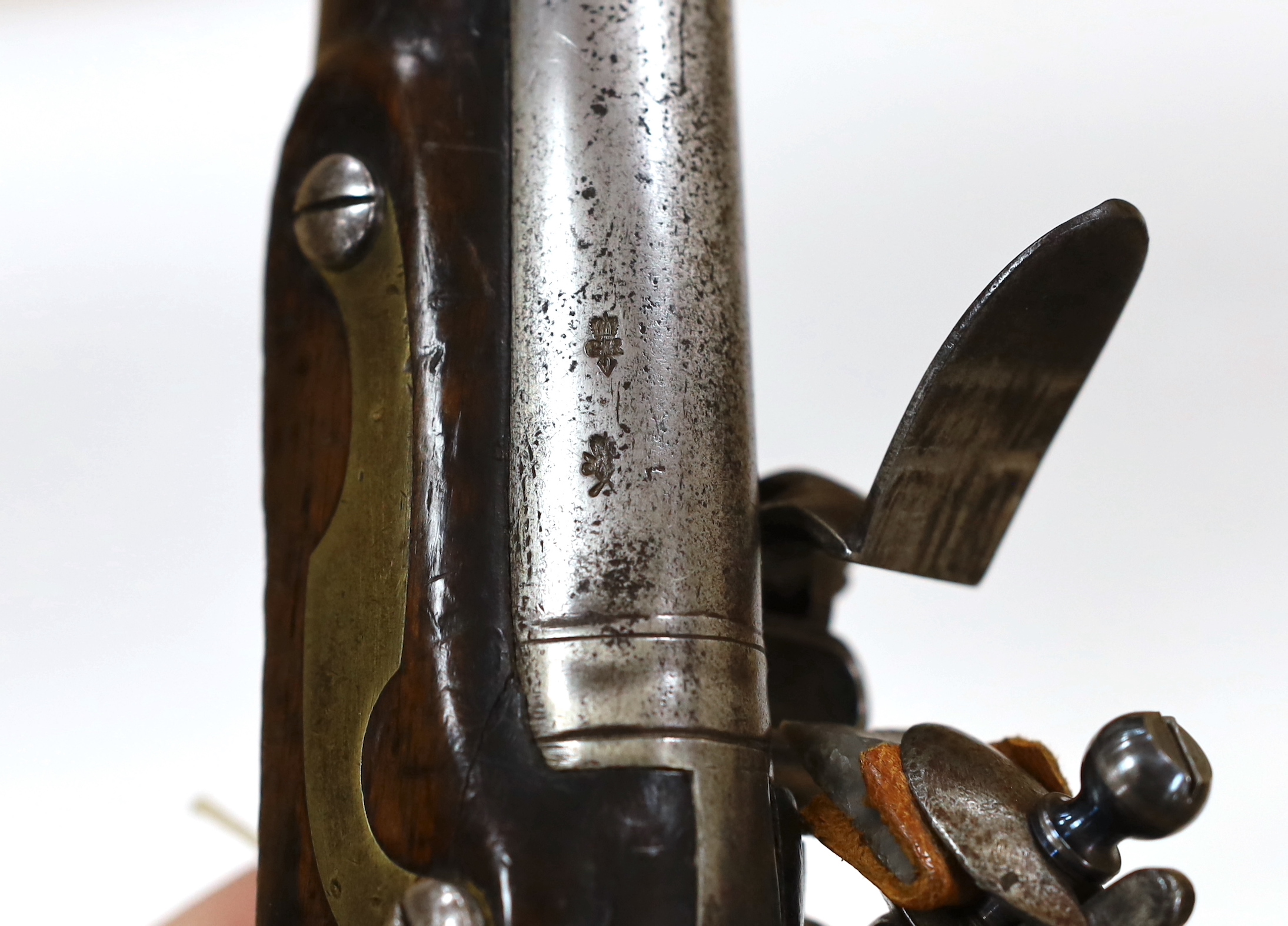 A 16 bore New Land Pattern flintlock service pistol with regulation lock engraved with crowned GR, Tower proofed barrel, fitted with regulation brass mounts and swivel ramrod